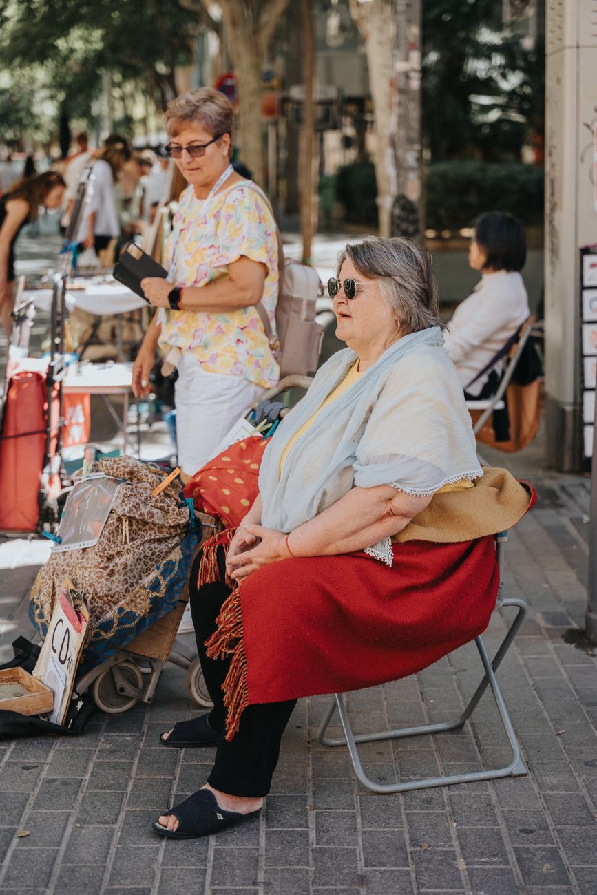 Local market stalls and event crowds in Mallorca